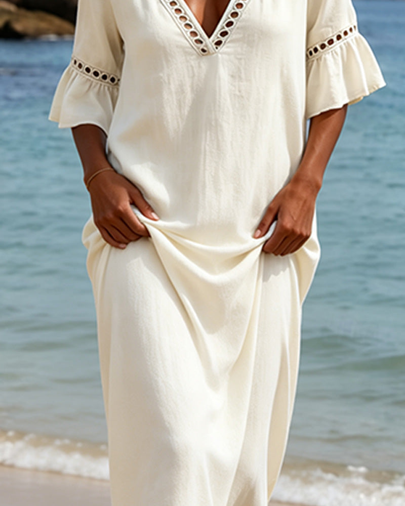 Nellina | Dress with a Deep V-Neck and Ruffles