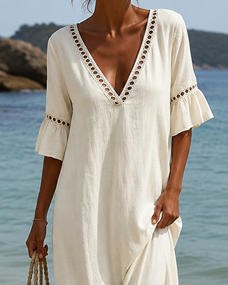 Nellina | Dress with a Deep V-Neck and Ruffles