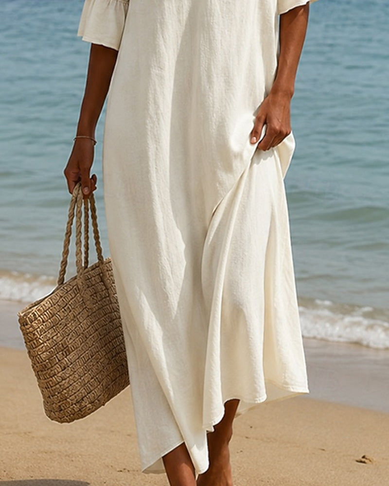 Nellina | Dress with a Deep V-Neck and Ruffles