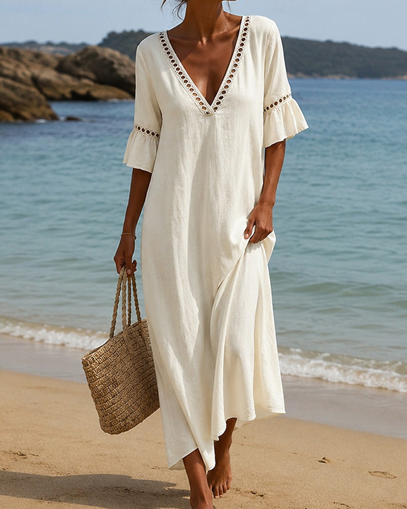 Nellina | Dress with a Deep V-Neck and Ruffles